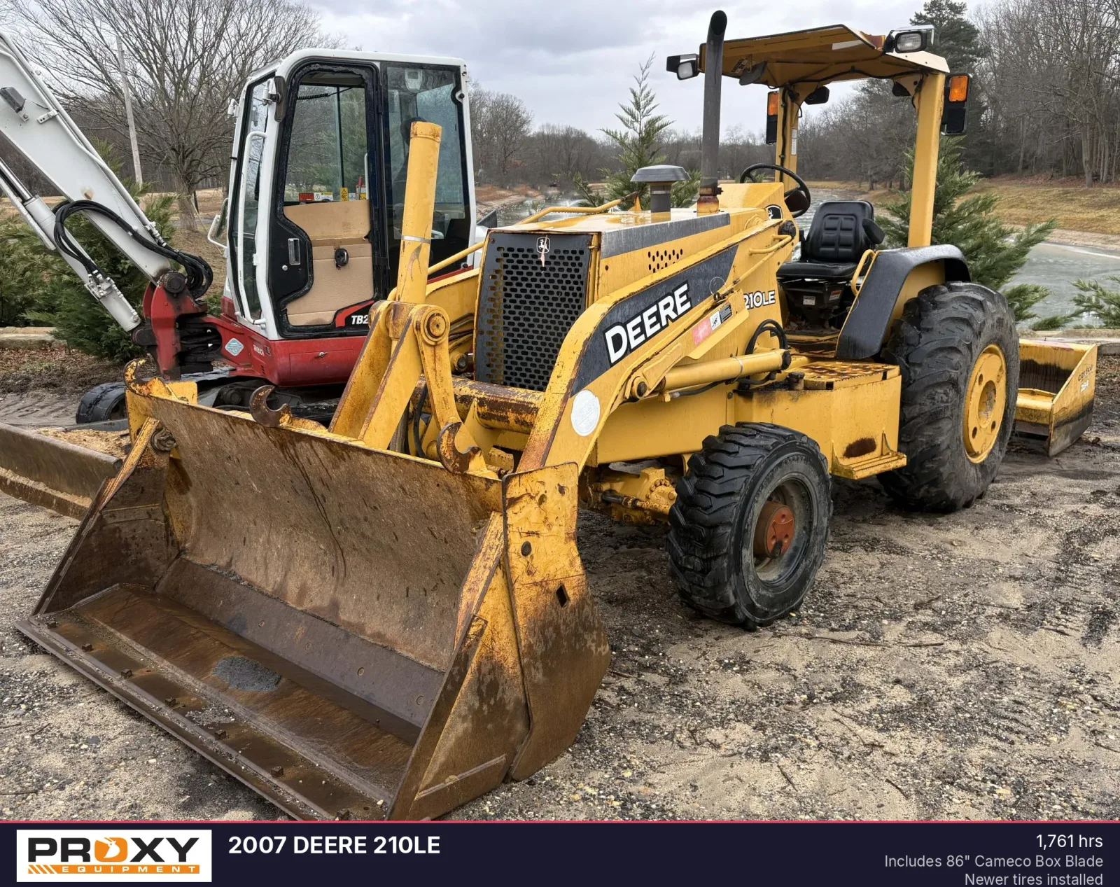2007 DEERE 210LE