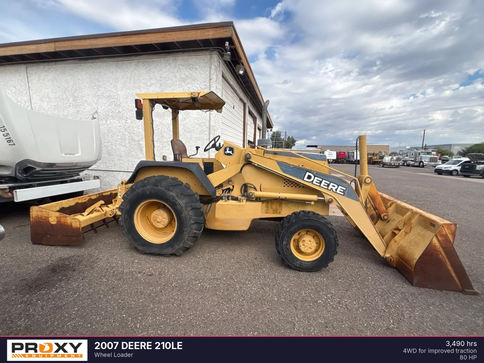 2007 DEERE 210LE
